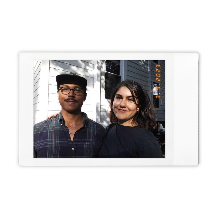 Mitra and Corey on a sunlit porch, September 2023